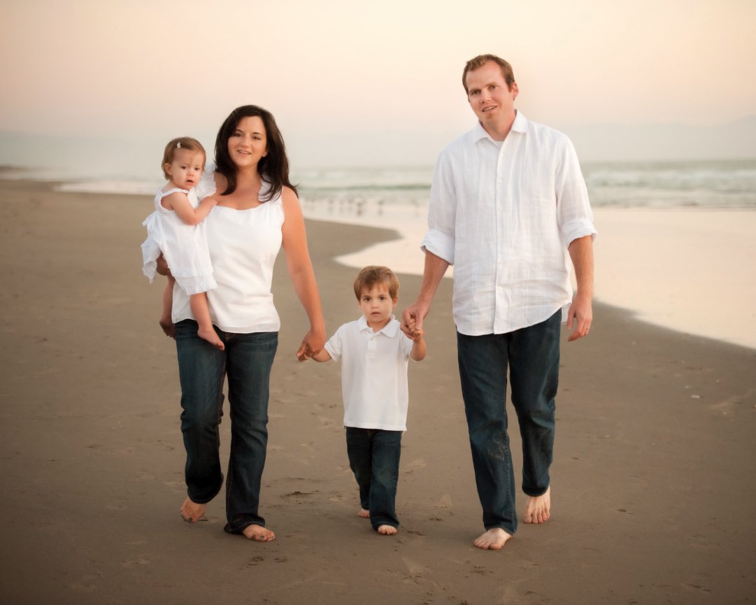 Barefoot on sand family portrait at Santa Cruz beach