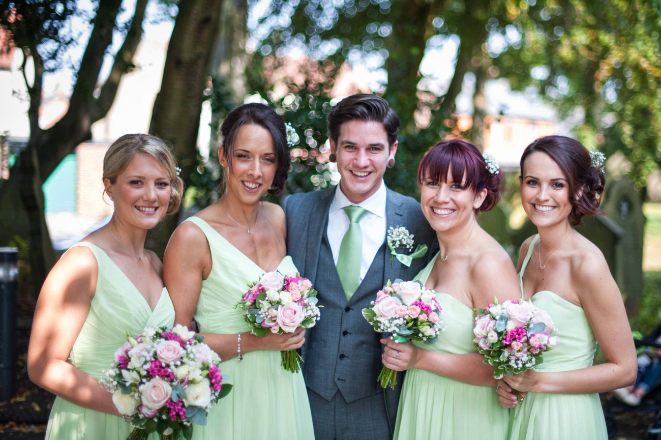 bridesmaids with guest at wedding