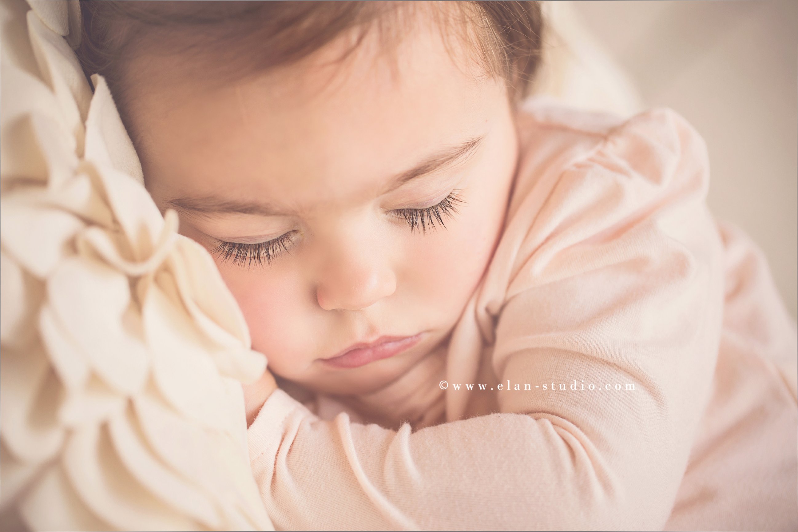 sleeping baby with long eyelashes