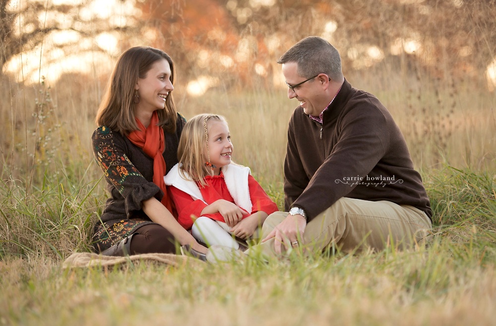 family_of_3_laughing_at_sunset_charlotte_nc