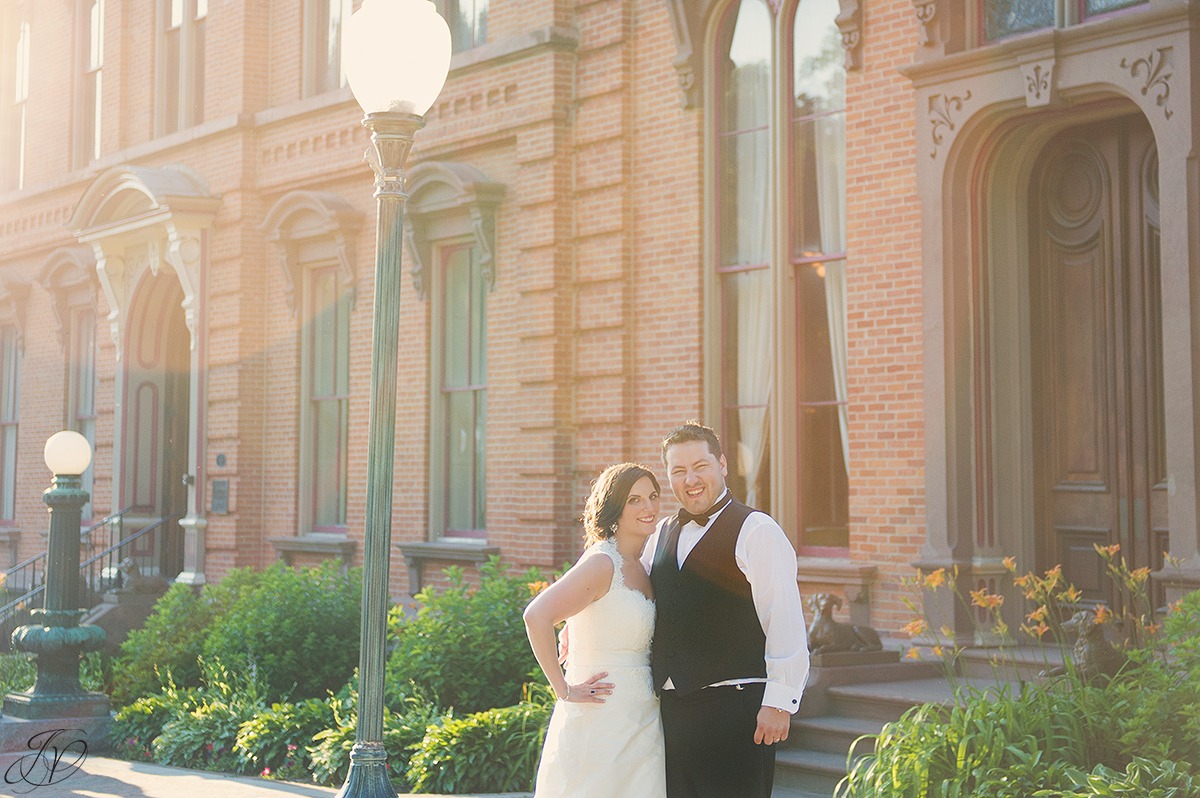 bride and groom sunset shot outside of canfield casino