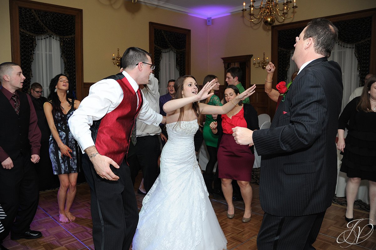 bride partying photo, bride dancing candid, Schenectady Wedding Photographer, The Stockade Inn, Reception candid photos, guests dancing candids, reception at the stockade inn