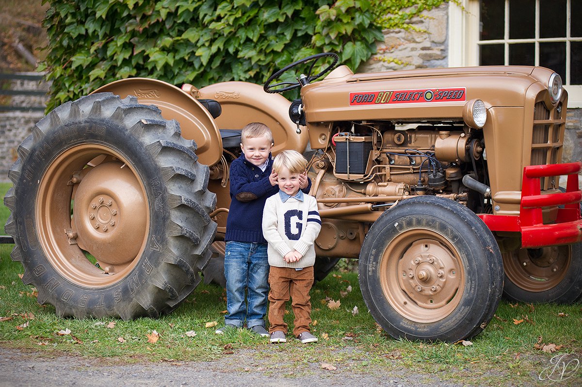 adorable photo of kids near tractors