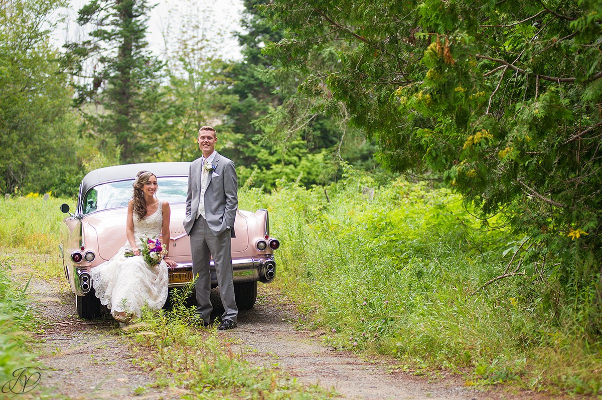 bride and groom on trail lake placid vintage car