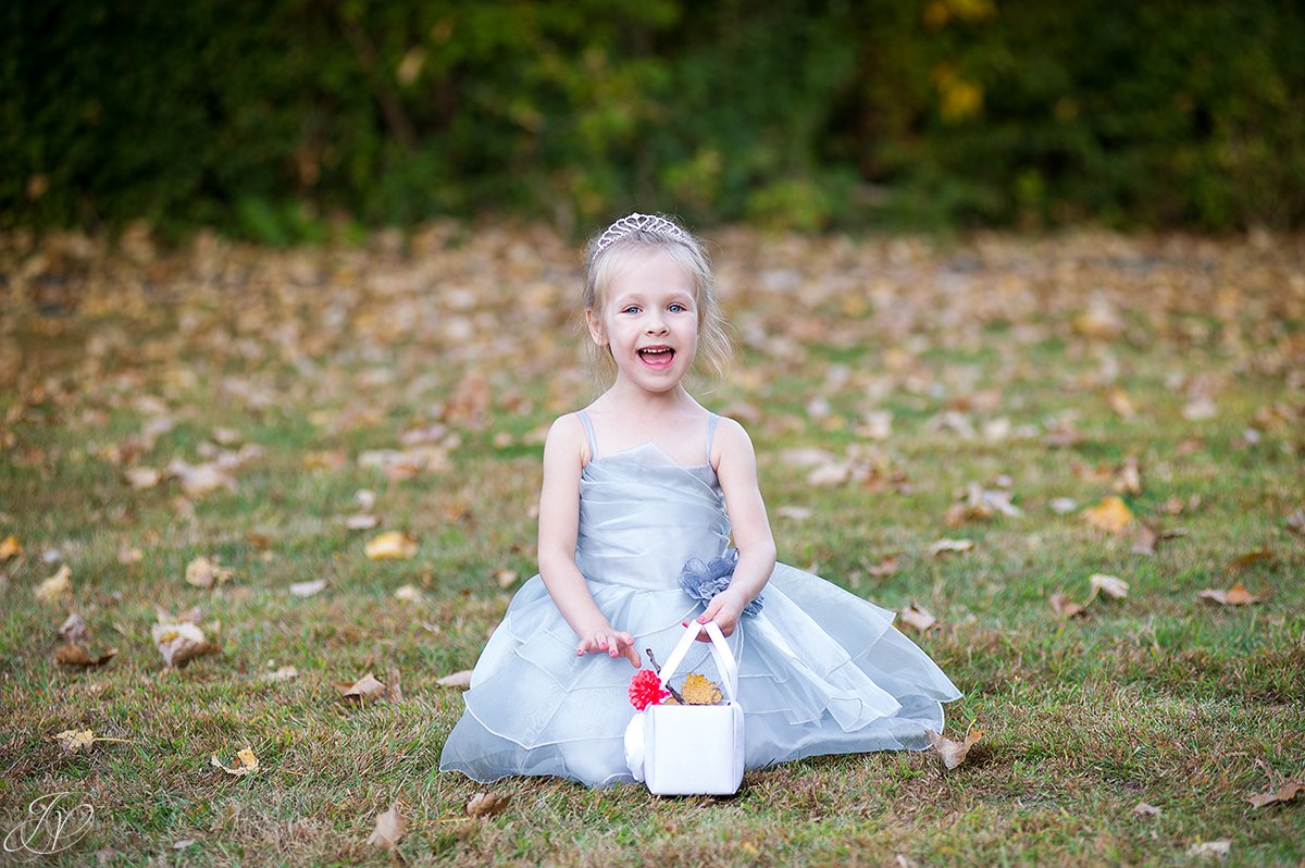 cute flower girl in the fall