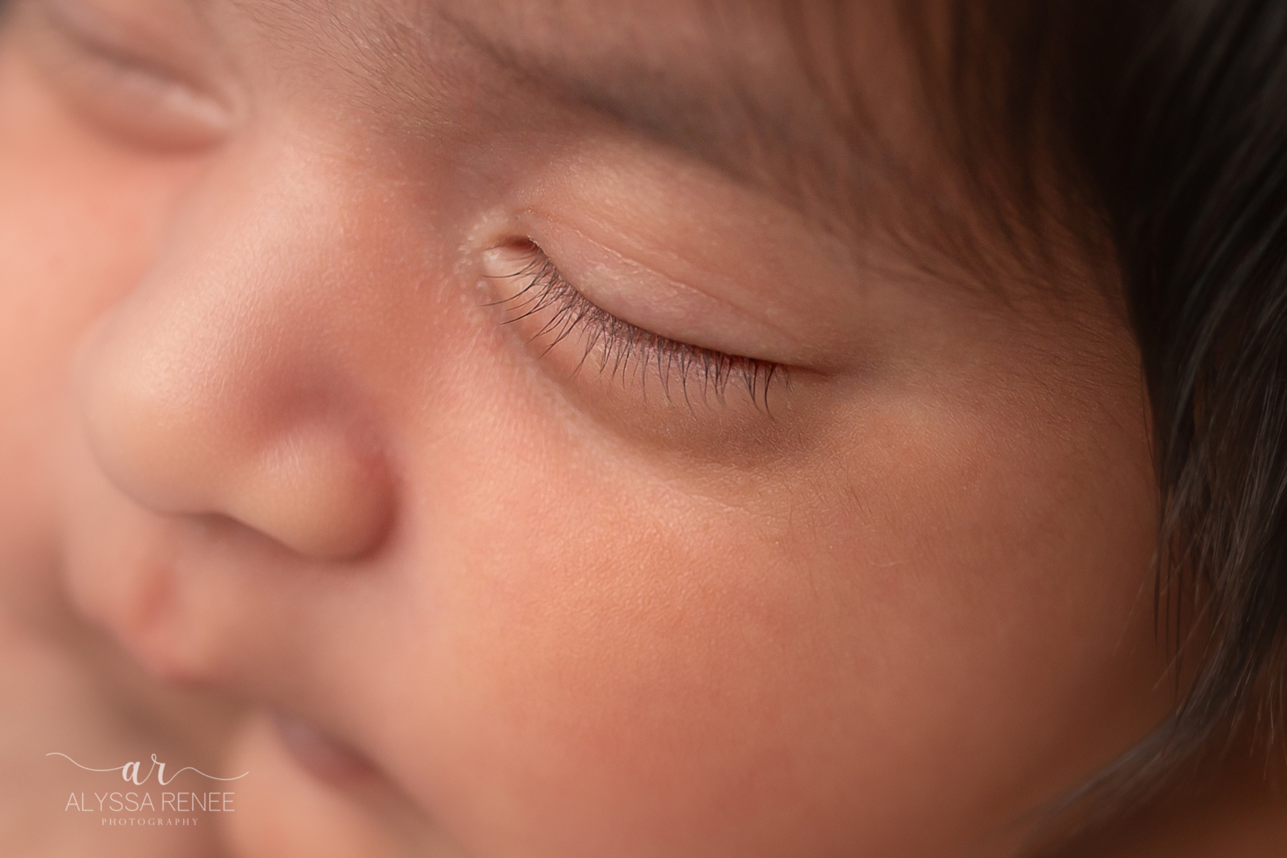 Detail shot of baby eyelashes from our newborn session with the Garcia family