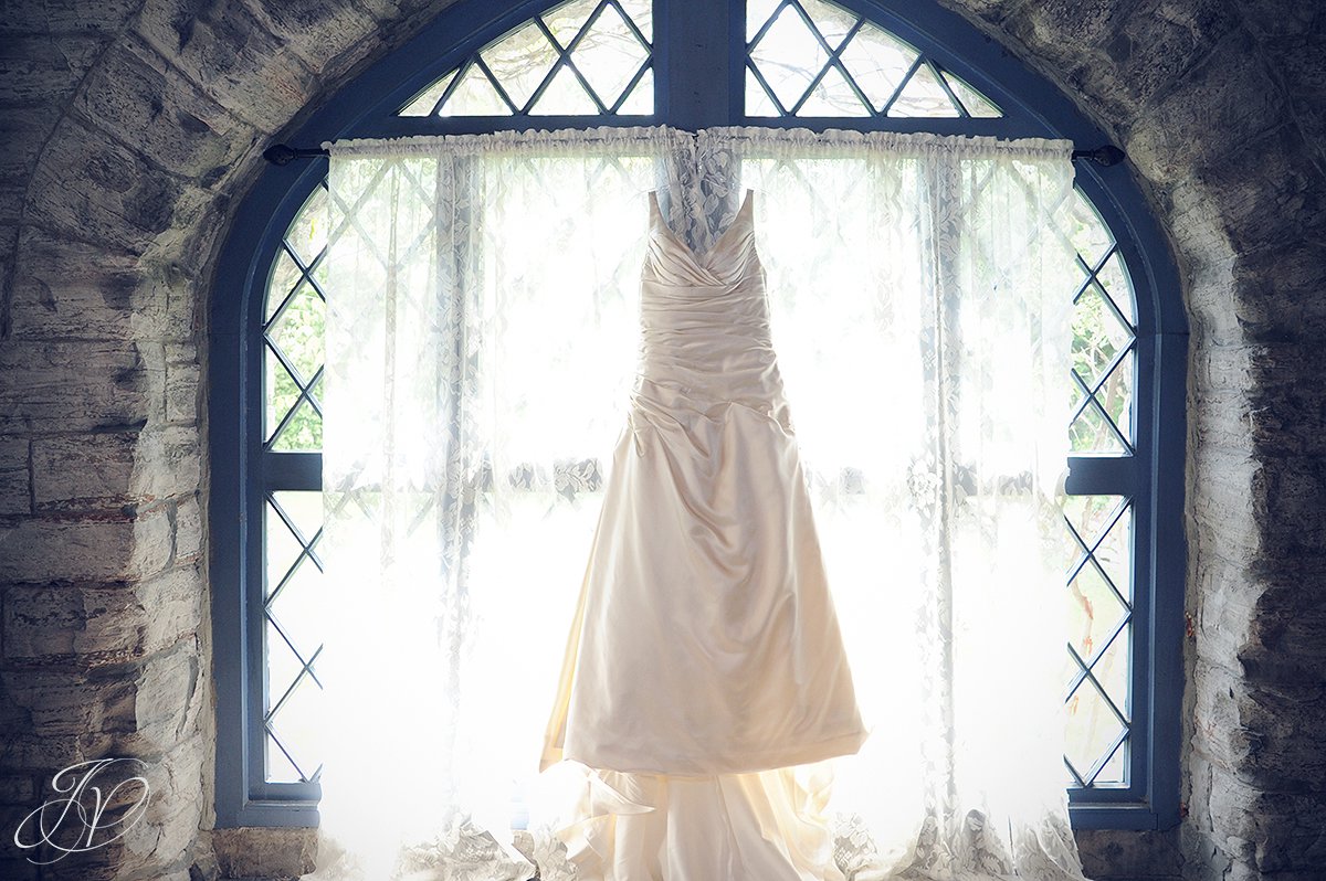 wedding gown in window, wedding gown in castle, sunlit wedding gown, prewedding details, wedding at beardslee castle, capital region wedding photographers