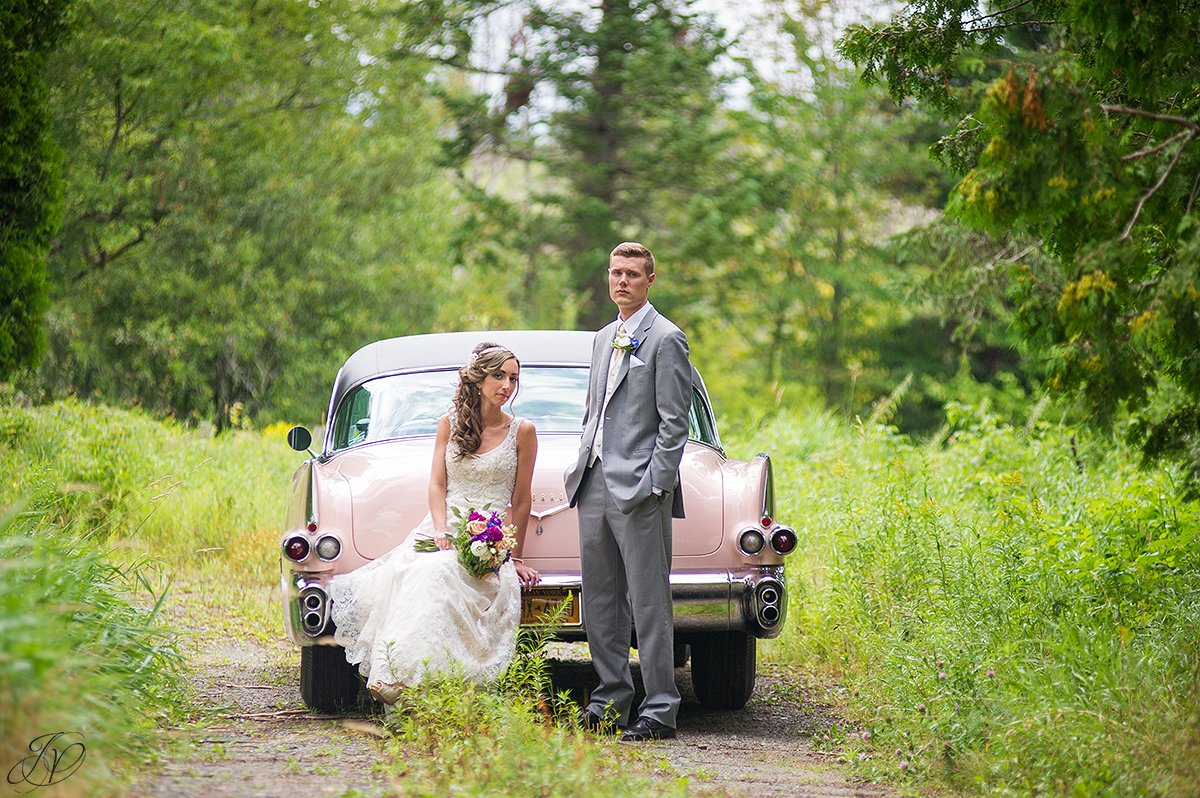 bride and groom on trail lake placid vintage car