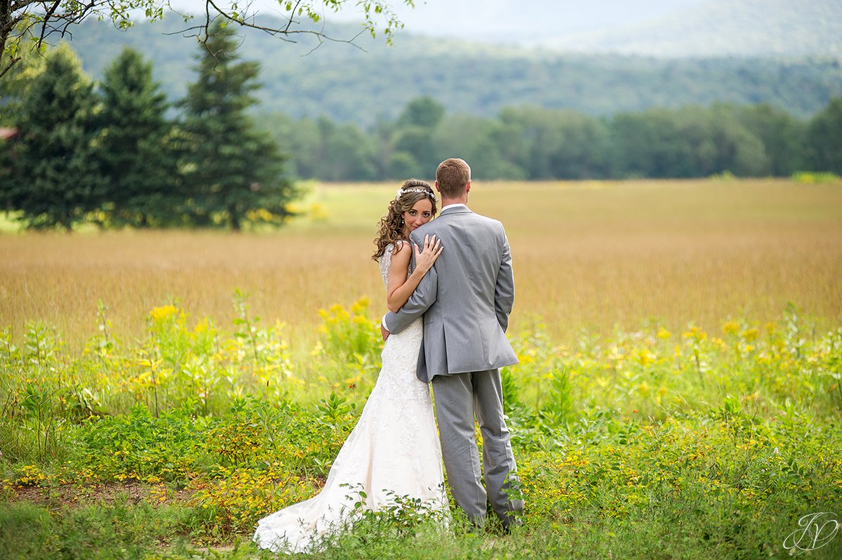 scenic bridal portrait in front of mountain lake placid