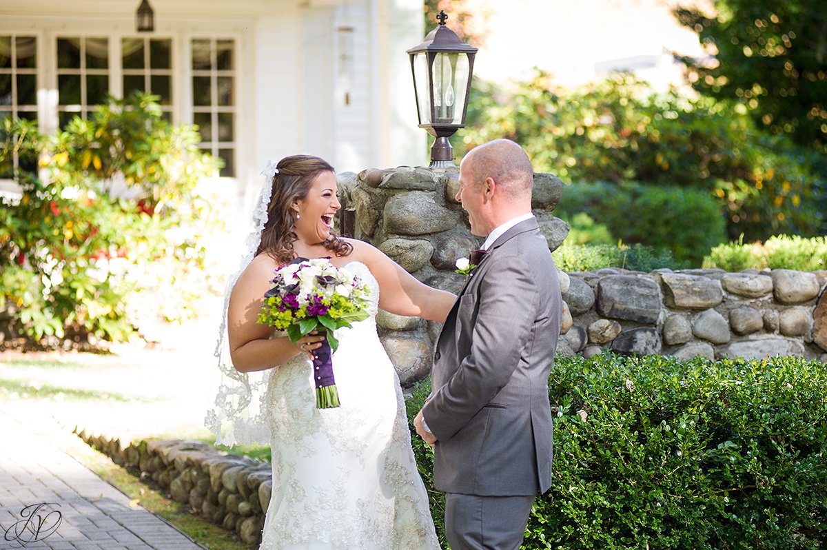 happy first look between bride and groom