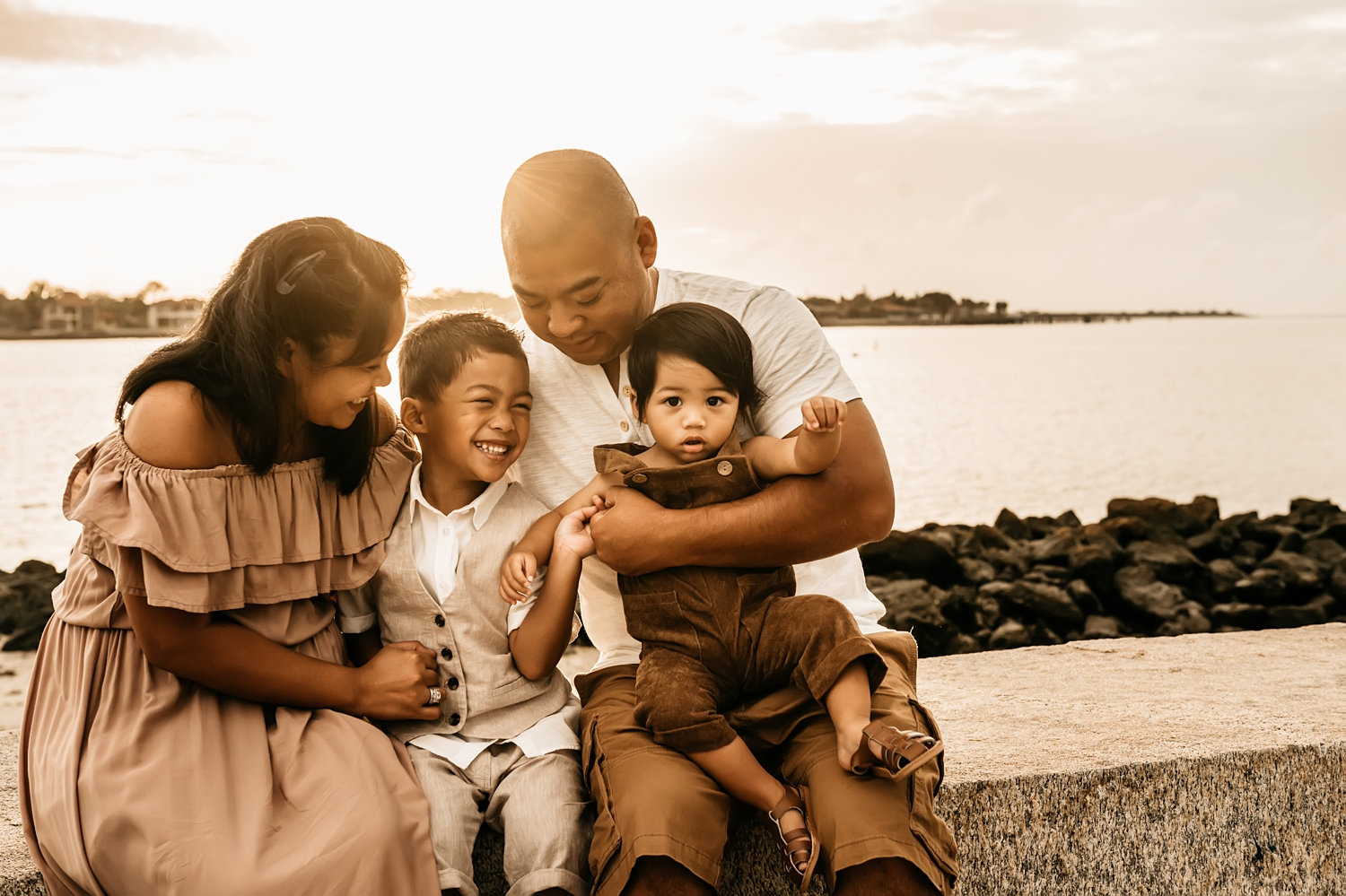 mom dad and 2 boys along the Saint Augustine waterfront, Florida family photography