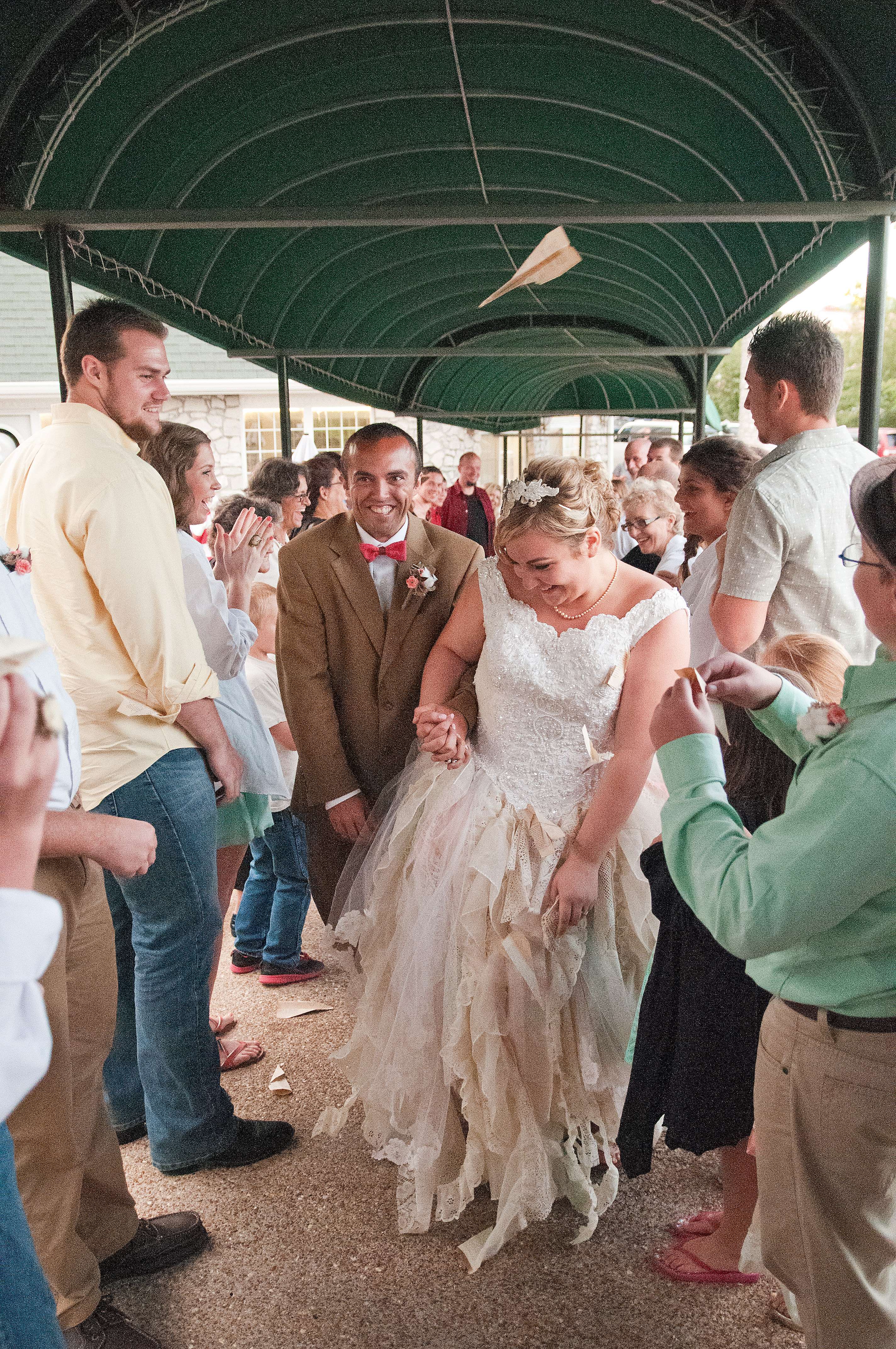 Wedding couple making grand entrance.