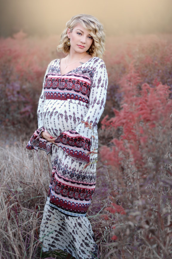 Maternity photo session at park at sunset