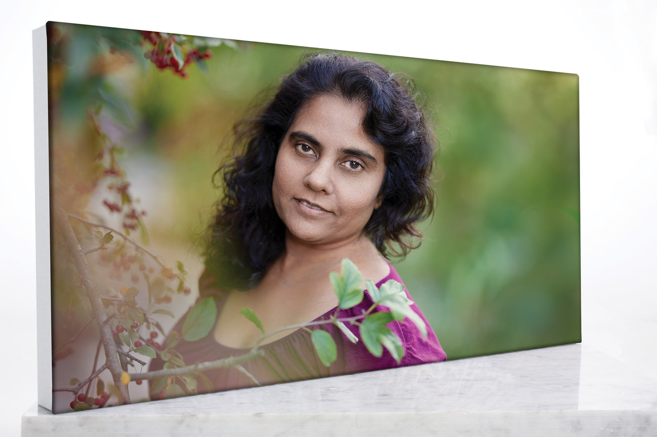 Canvas wall art featuring an outdoor portrait of a woman with soft natural tones, presented as a unique, modern statement piece with a refined, gallery-style finish.