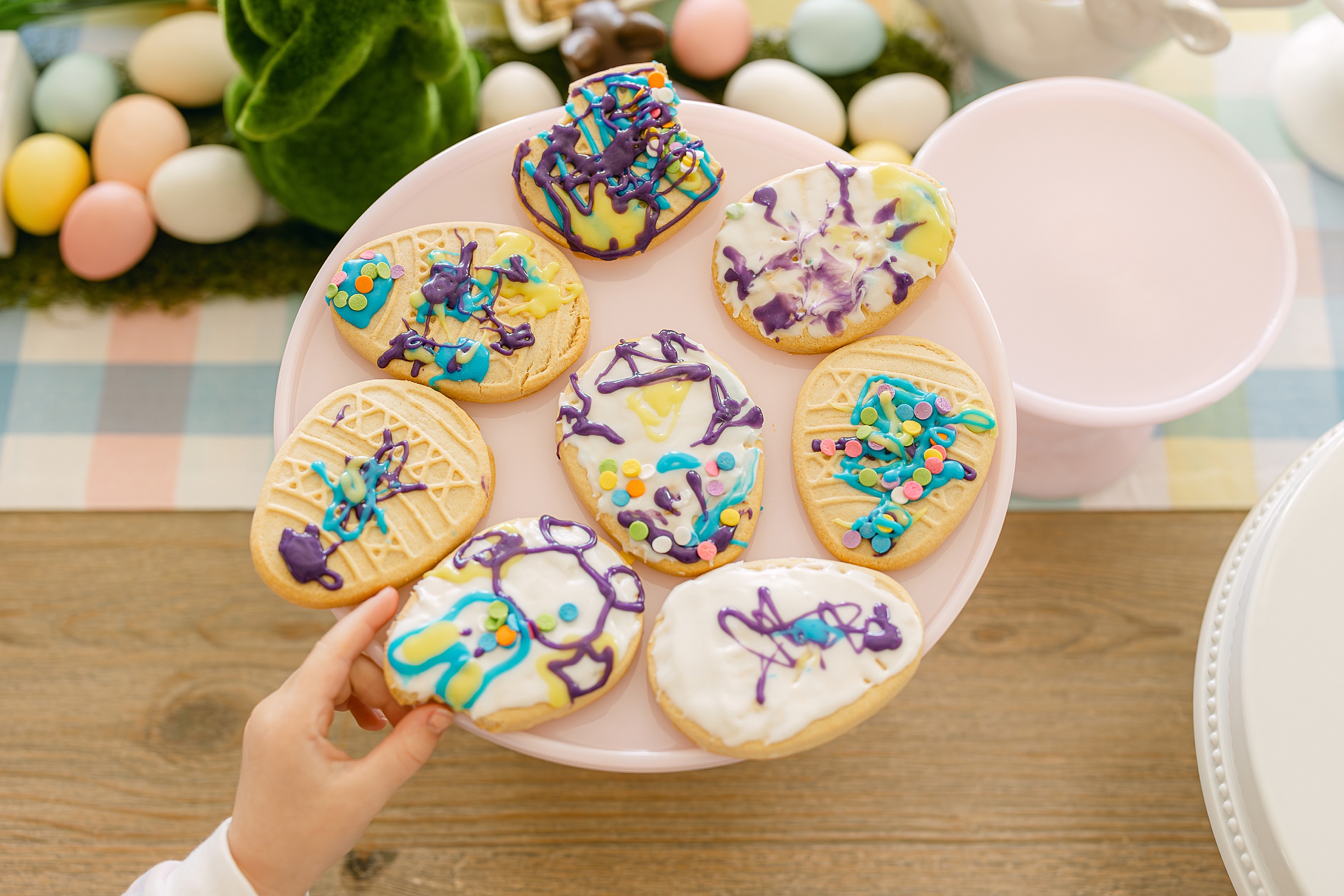 Colorful Easter cookies decorated by children.