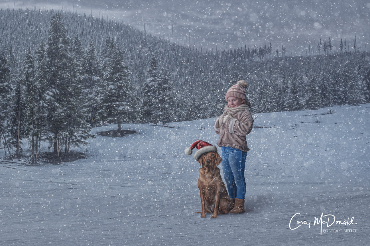 Child in winter clothing stands in snow next to a dog wearing a Santa hat, with snowy trees and hills in the background.