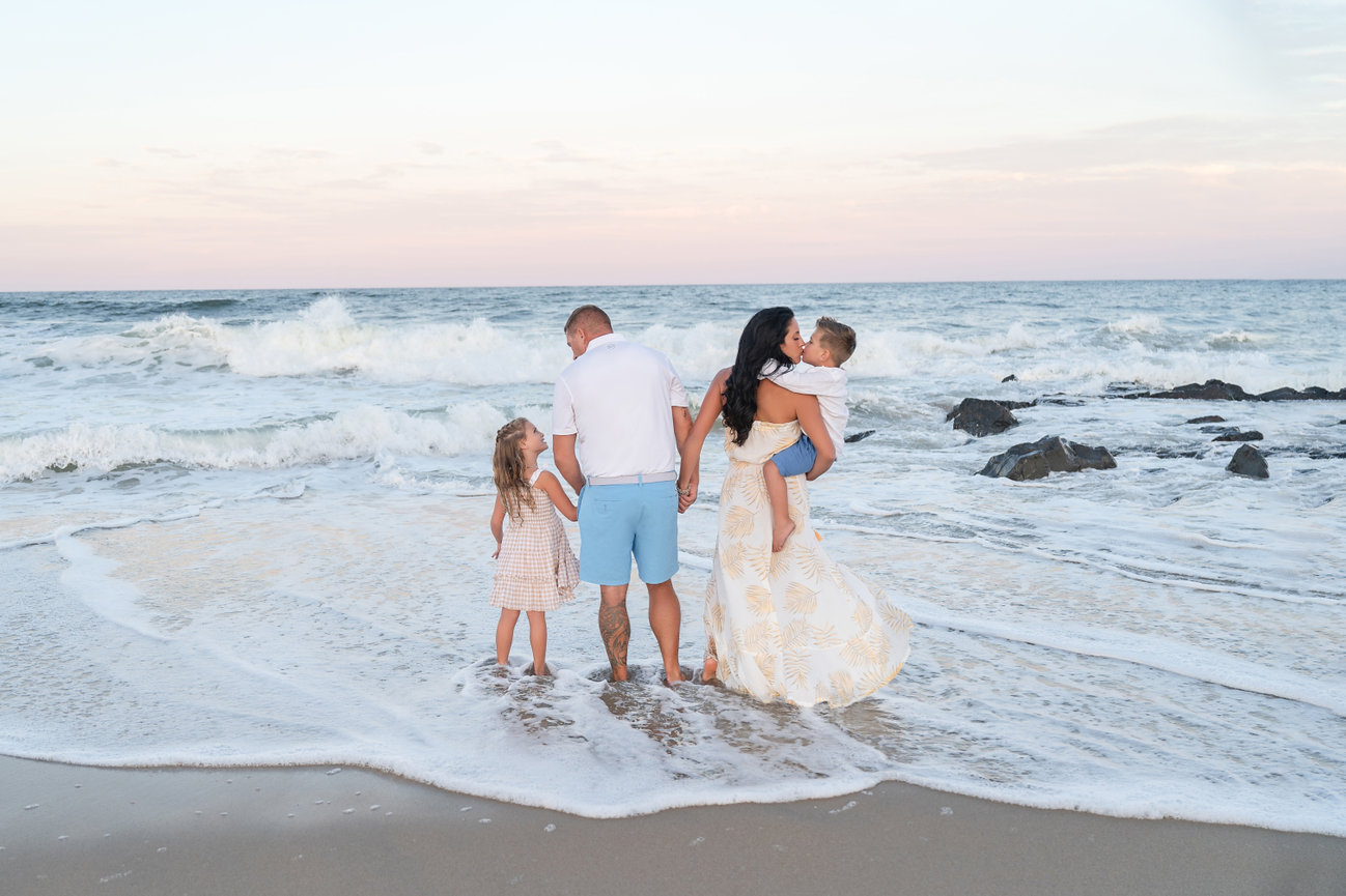 Organic moment of connection captured during beach play on the Sea Girt beach