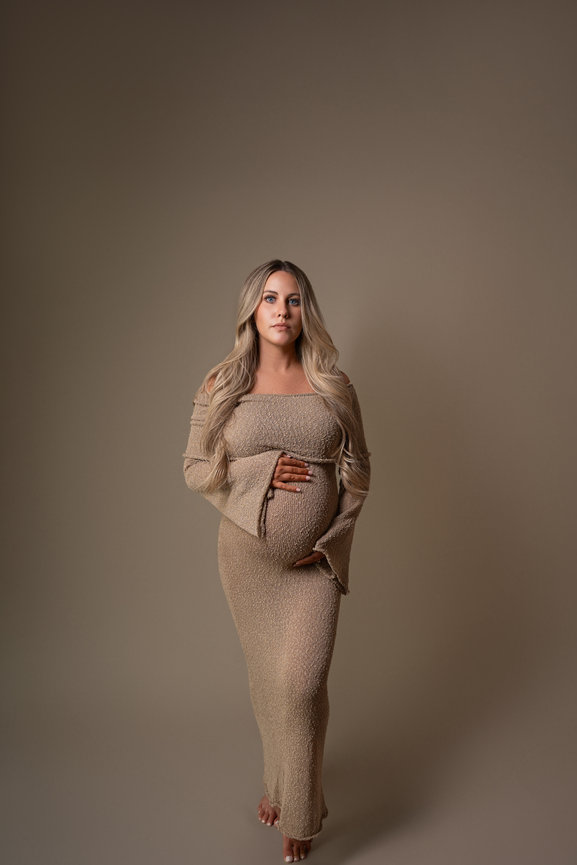 Expecting mother in flowing neutral gown, Colts Neck NJ session