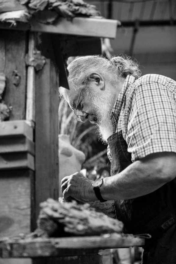 White Male Artist, black and white older male with beard, Artist working with hands, Photography by Heather Raub of FrontRoom Images