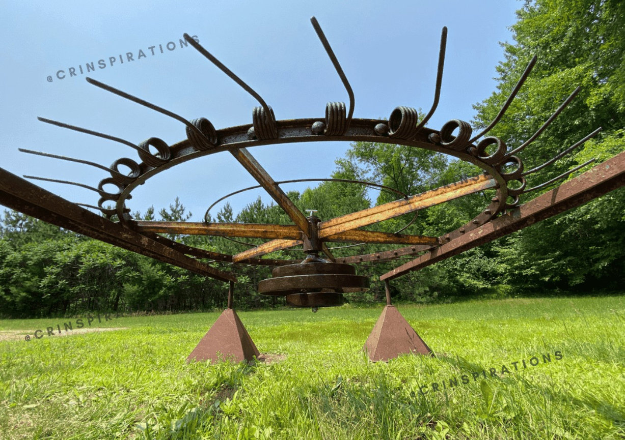 Farm salvage, upcycled and reimagined, starting with a rake wheel.