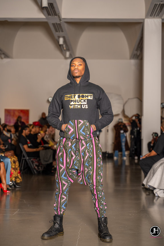 charlotte event photography event photos fashion show photographing a male fashion model walking the runway bechtler museum jo hayes images