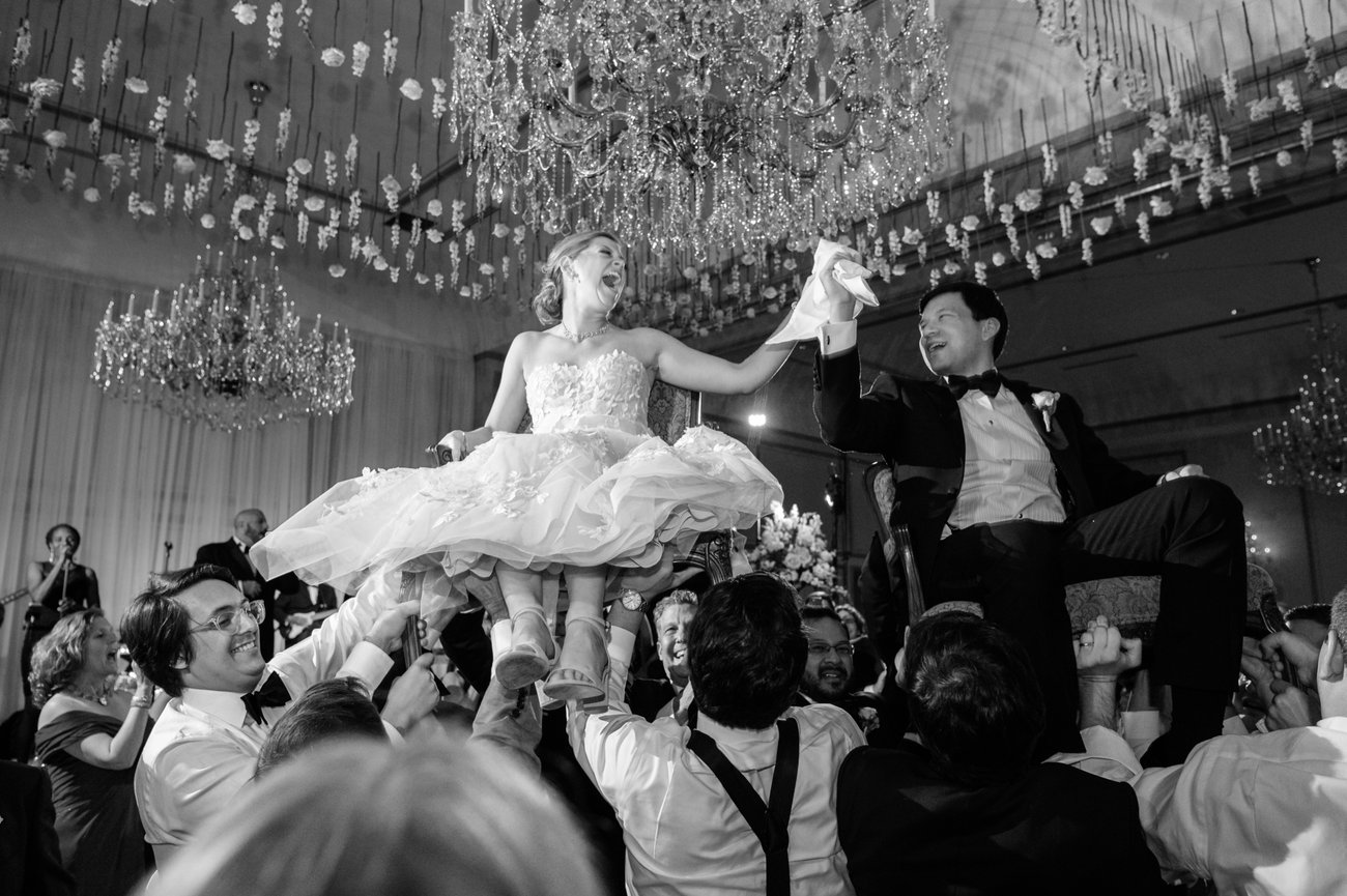 Black and white image of Hora dance during a Jewish wedding at Grand Bohemian Mountain Brook. Birmingham wedding photography by Heather Durham.