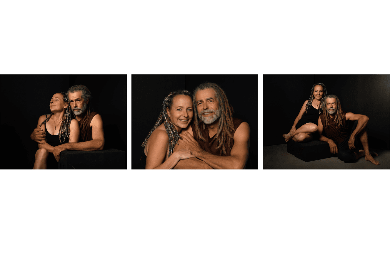Xene and her partner Robert, both in dreadlocks, are warmly folded into each other at Kliks Photography.