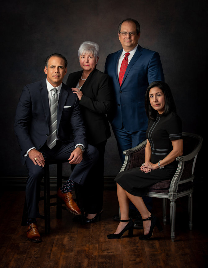 Photo of Group of Business people two sitting two standing