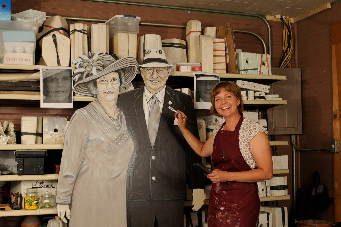 The artist of the Taylor 'Villagers' working in her shop at Taylor, NE.